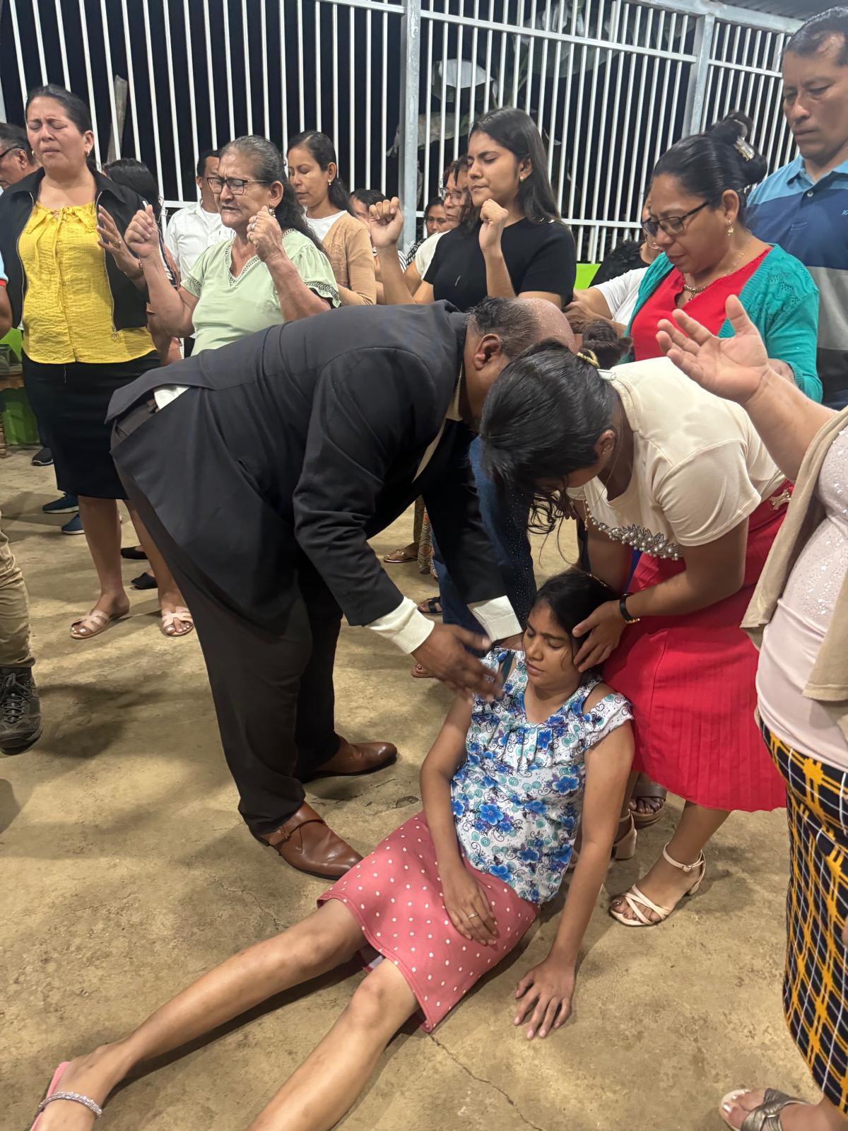 Prayer ministry during a service in Nicaragua